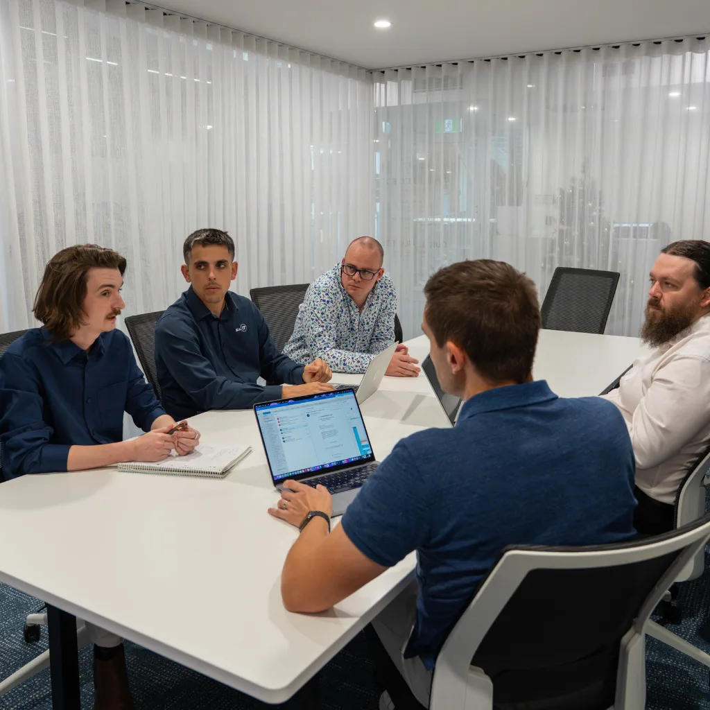 ALL IT team working together