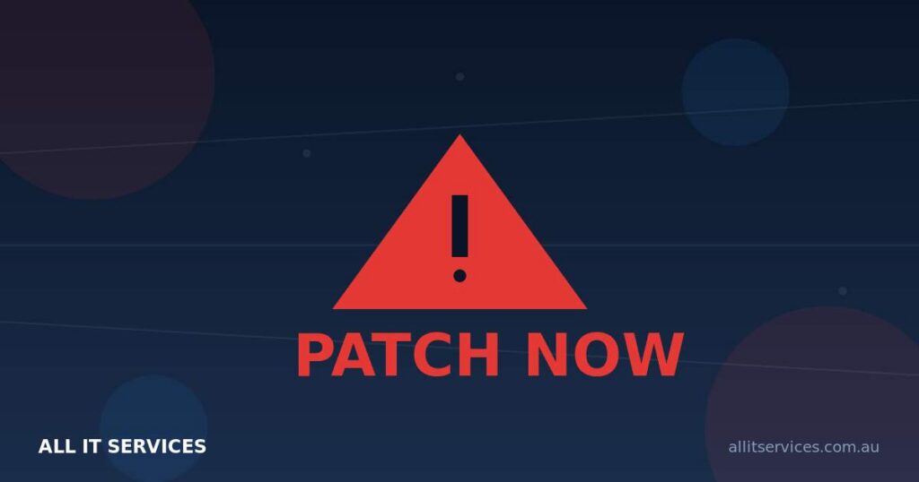 Red warning triangle with PATCH NOW label on dark navy All IT Services branded background