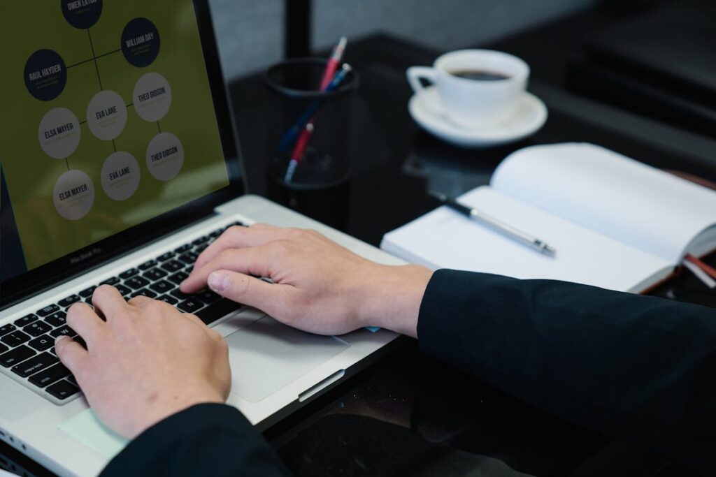 Person typing on a laptop — Azure Active Directory and identity management for Australian SMBs